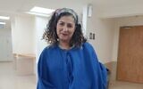 Social worker Tami Gross, who was instructed to cover up with a cloak at the Haifa Rabbinic Court, June 21, 2023. (Mavoi Satum)