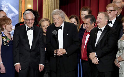 Tom Stoppard, center, and members of the company of "Leopoldstadt" accept the award for best play at the 76th annual Tony Awards at the United Palace theater in New York on June 11, 2023. (Photo by Charles Sykes/Invision/AP)