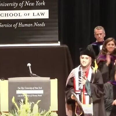 Fatima Mohammed acknowledges the crowd after speaking at CUNY School of Law on May 12 (Youtube screenshot; used in accordance with clause 27a of the copyright law)