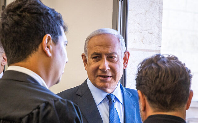 Benjamin Netanyahu arrives for his trial at the District Court in Jerusalem, May 10, 2022 (Oren Ben Hakoon/POOL)