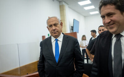 Benjamin Netanyahu arrives for a court hearing in his trial at the Jerusalem District Court on May 31, 2022. (Yonatan Sindel/ Flash90)