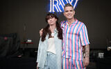 British pop star Robbie Williams, right, and Israeli singer Noga Erez in Tel Aviv, May 31, 2023. (Avshalom Sassoni/FLASH90)