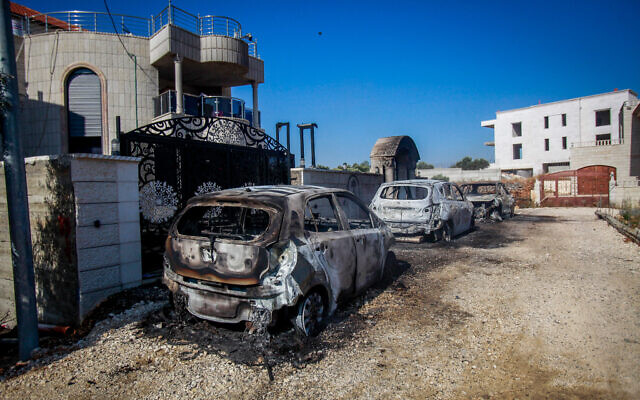 The damage caused to Palestinian homes and cars by extremist Jewish settlers in the West Bank village of Turmus Ayya, on June 21, 2023 (Nasser Ishtayeh/Flash90)
