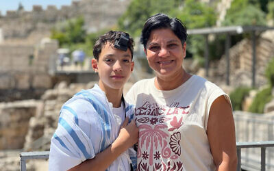 Ofri Meoded Danon and his mother celebrate his bar mitzvah at the egalitarian plaza of the Western Wall in Jerusalem, Israel in May 2023. (Courtesy of Meoded Danon)
