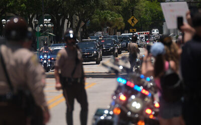 A motorcade of vehicles, with former US president Donald Trump on board, arrives at Wilkie D. Ferguson Jr. United States Federal Courthouse in Miami, Florida, on June 13, 2023. (Photo by RICARDO ARDUENGO / AFP)